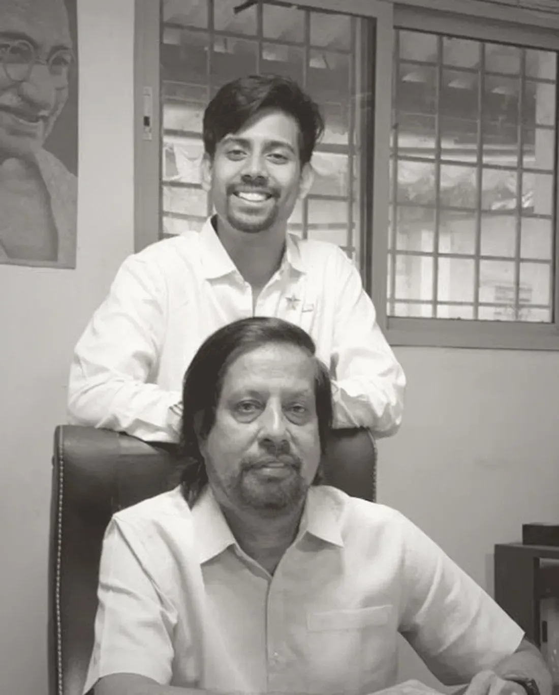 A founder of 2M Engineers with his son at the works