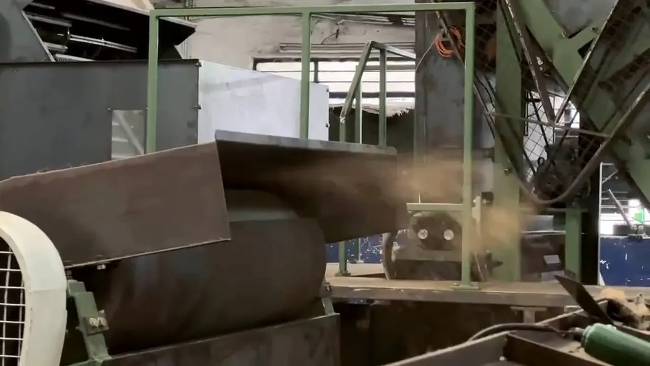 Coir coming off the chute on the line at the 2M Engineers works in Peenya